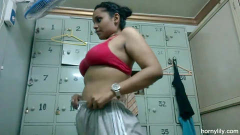 Horny Lily, a curvy Tamil Indian maid, plays in bathroom changing bra and teasing in panties