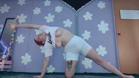 Adorable older woman practices yoga and flaunts her huge breasts